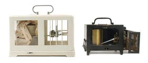 * Two Metal Cased Barographs Height of larger 7 x width 10 1/2 x depth 5 1/ inches.