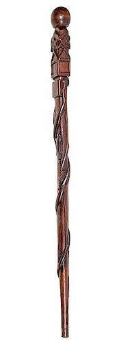 8. Masonic Folk Cane-  Ca. 1880- A carved hardwood folk cane with four Masonic emblems- long guns- spears-horse-and other i
