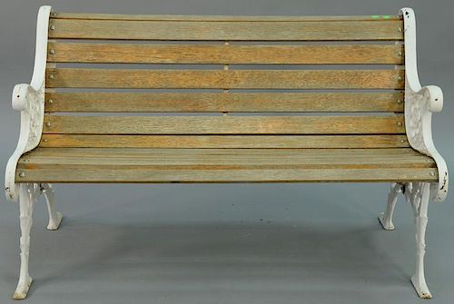 Park style bench having wood slats and iron ends. height 30 1/2 inches, width 49 1/2 inches Provenance: Property from the