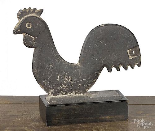 Cast iron rooster windmill weight.