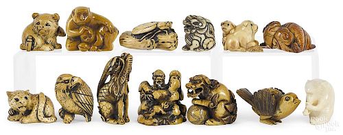 Thirteen Japanese carved ivory animal netsukes