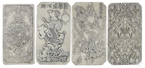 Four Chinese silver scroll weights