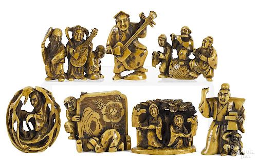 Seven Japanese carved figural netsukes
