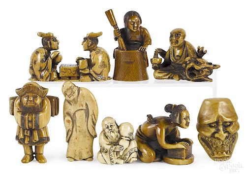Eight Japanese carved figural netsukes