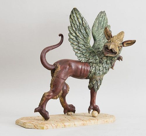 CONTINENTAL BAROQUE CARVED AND PAINTED WOOD FIGURE OF A GRIFFIN