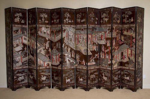 CHINESE CARVED AND PAINTED COROMANDEL LACQUER TWELVE-PANEL SCREEN