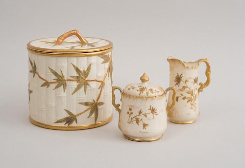 ROYAL WORCESTER PORCELAIN BISCUIT JAR AND COVER WITH 'BAMBOO" SURFACE AND A ROYAL WORCESTER TYPE CREAMER AND COVERED SUGAR BO