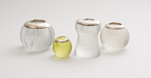 FOUR ENGLISH SILVER-MOUNTED GLASS MATCH STRIKERS
