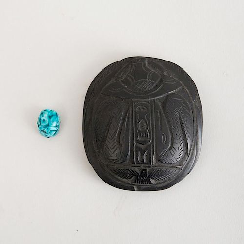 EGYPTIAN CARVED BLACK STONE SCARAB AND A TURQUOISE FAIENCE SCARAB