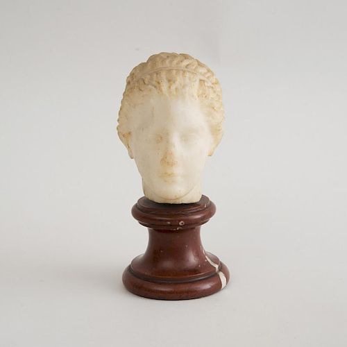 CARVED MARBLE HEAD OF A GIRL