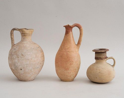 THREE CYPRIOT POTTERY EWERS