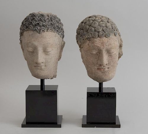 TWO GANDHARAN CLAY BUSTS, ONE OF BUDDHA, THE OTHER A BODHISATTVA