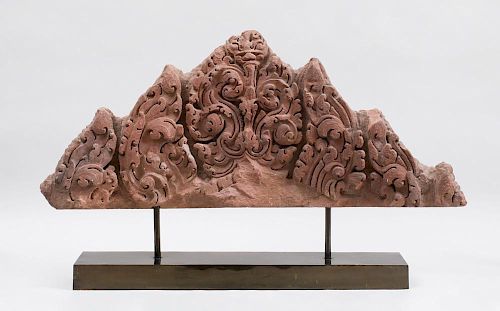 KHMER CARVED RED STONE ARCHITECTURAL FRAGMENT