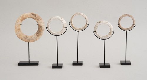 GROUP OF TEN CHINESE ARCHAIC CALCIFIED MARBLE BANGLES
