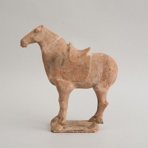 CHINESE TANG STYLE UNPAINTED POTTERY FIGURE OF A HORSE