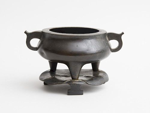 CHINESE BRONZE GUI CENSER WITH LOTUS FORM STAND