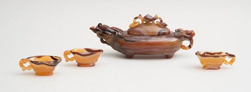 CHINESE CARVED CARNELIAN BEAST-FORM WINE VESSEL AND COVER