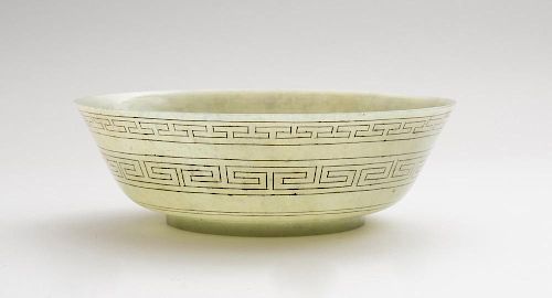 CHINESE PALE GREEN JADE FOOTED BOWL