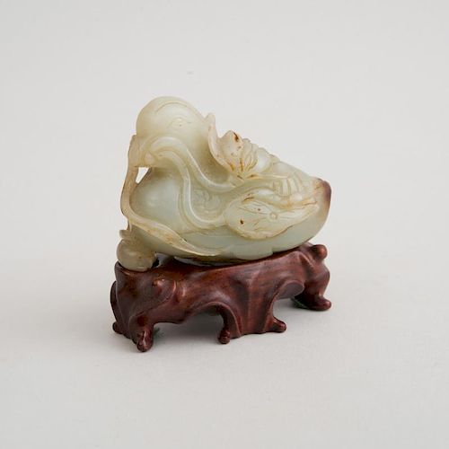 CHINESE CARVED LIGHT-GREEN JADE FIGURE OF A DUCK
