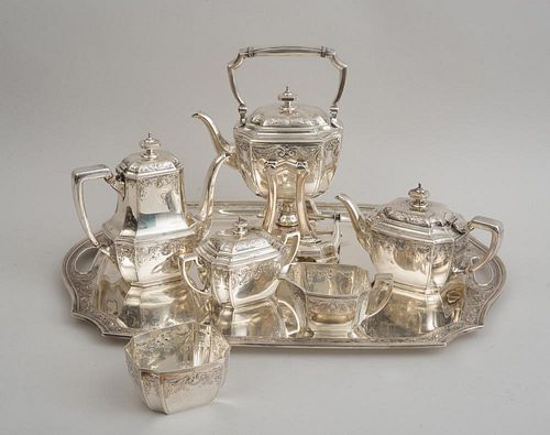 TIFFANY & CO. CRESTED SILVER SIX-PIECE TEA AND COFFEE SERVICE AND A MATCHING CRESTED SILVER TRAY