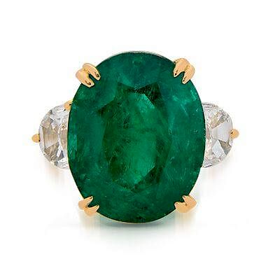 Important Classic oval emerald and diamond ring.