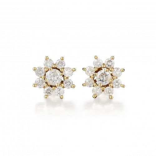 A Pair of 14K Gold Diamond Earrings