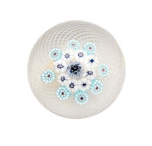 Clichy, France, 19TH CENTURY, blue and white edelweis miniature paperweight, on latticino ground