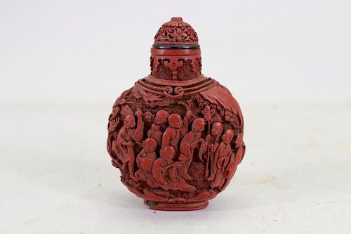 Chinese Qing Dynasty Figural Cinnabar Snuff Bottle