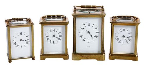 Four Brass and Beveled Glass Carriage Clocks