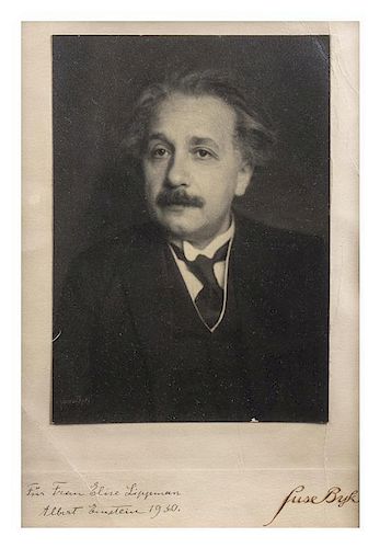 EINSTEIN, ALBERT. Black and white portrait photograph by Suse Byk inscribed in margin, Fur Frau Elise Lippman/Albert Einstein 19