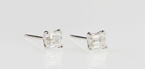 Pair of 14K White Gold Diamond Stud Earrings, each with a .0335 carat princess cut diamond, total diamond weight- .67 cts., w