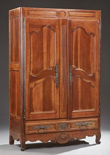 French Louis XV Style Carved Walnut Armoire, 19th c., now lacking the crown, the square top over double two panel doors with 