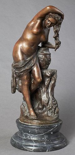 Continental School, "The Bather," 20th c., patinated bronze on a figured stepped black circular figured marble base, H.- 19 i