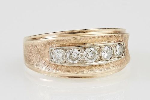 Man's 14K Yellow Gold Dinner Ring, the wide Florentine finish band mounted with a central row of five channel set round diamo