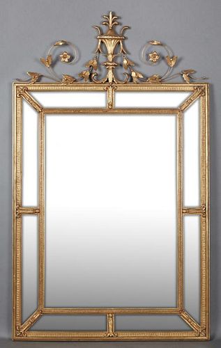 Classical Style Florentine Gilt Wood Overmantle Cushion Mirror, 20th c., with an urn surmount flanked by scrolling gilt iron 