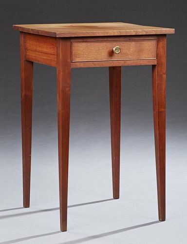 American Carved Walnut Lamp Table, 19th c., the square top over a frieze drawer, on tall tapered square legs, H.- 29 3/8 in.,
