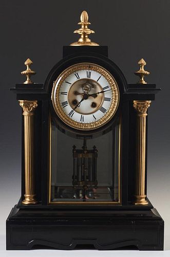 French Gilt Bronze and Black Marble Mantle Clock, c. 1870, by Samuel Marti, the arched top with a gilt bronze finial over a b