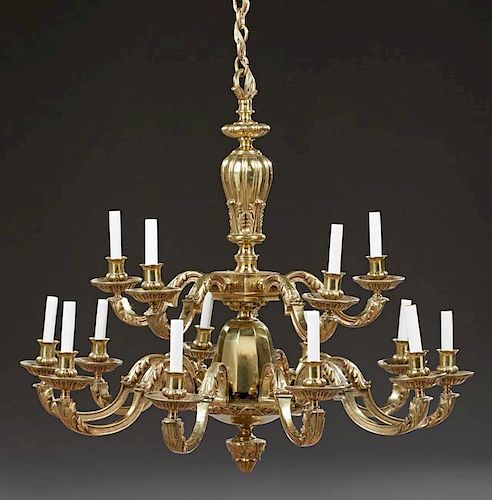 Louis XV Style Fifteen Light Bronze Chandelier, 20th c., with a baluster relief support to a pentagonal support issuing five 