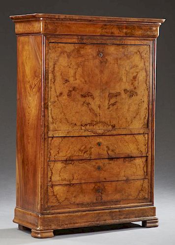 French Louis Philippe Carved Walnut Secretary Abattant, c. 1860, the rounded corner rectangular top over a cavetto frieze dra