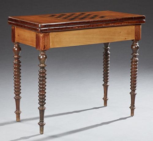 French Inlaid Carved Cherry and Walnut Games Table, late 19th c., the inlaid chess board top opening to a baize lined interio