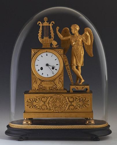 Exceptional French Empire Style Gilt Bronze Mantle Clock, 19th c., with a gilt lyre surmount over a rectangular case with rel