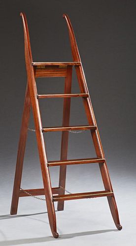 Regency Style Mahogany and Brass Folding Library Ladder, early 20th c., the brass edged steps supported by mahogany ends with