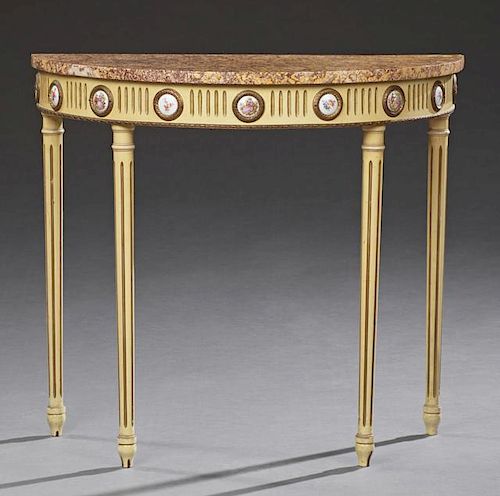 Louis XVI Style Marble Top Console Table, 20th c., the highly figured demi-lune tan and violet marble over a reeded skirt mou