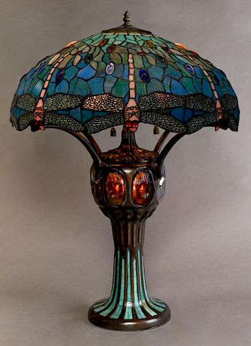 Tiffany Style Leaded Slag Glass Dragonfly Lamp, 20th c., the scalloped circular shade with dragonfly figures and blue cabocho