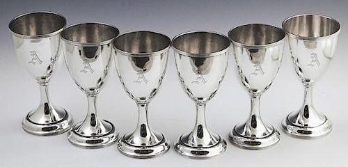 Set of Six Sterling Goblets, early 20th c., by Davis & Freeman, #20, the rims with four relief ribs, to a like base, monogram