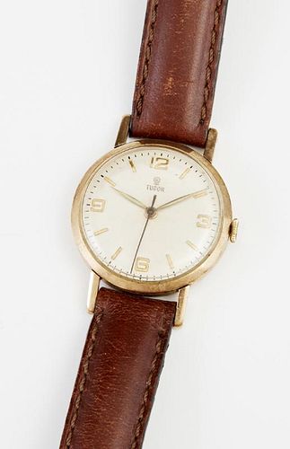 Man's Manual Wind 9K Yellow Gold Tudor Wristwatch, with gold chapter marks, #145136, the inside of the back stamped .375 and 