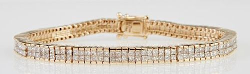 14K Yellow Gold Tennis Bracelet, each of the 100 rectangular links mounted with two small diamonds, total diamond weight- 6.7