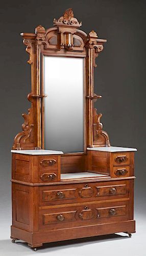 Renaissance Revival Carved Walnut Dropwell Dresser, c. 1880, with a relief carved leaf and scroll form crest over a mirror, f