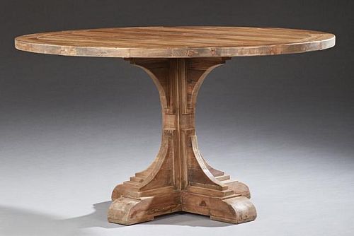 Continental Style Carved Walnut Circular Dining Table, late 20th c., the segmented top within a wide border on a tiered squar