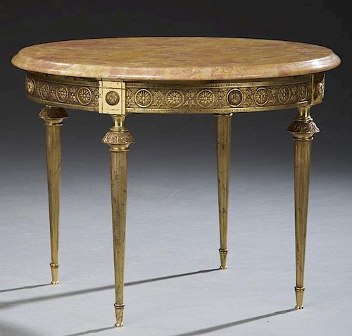 French Louis XVI Marble and Bronze Diminutive Circular Coffee Table, 20th c., the stepped ocher marble over a relief ormolu s